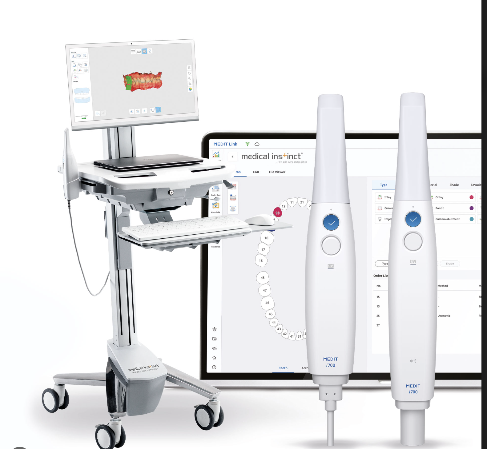 A modern dental imaging system with handheld scanners and a computer workstation.
